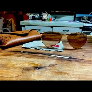 Ray Ban Aviators rose gold lenses gold hardware.